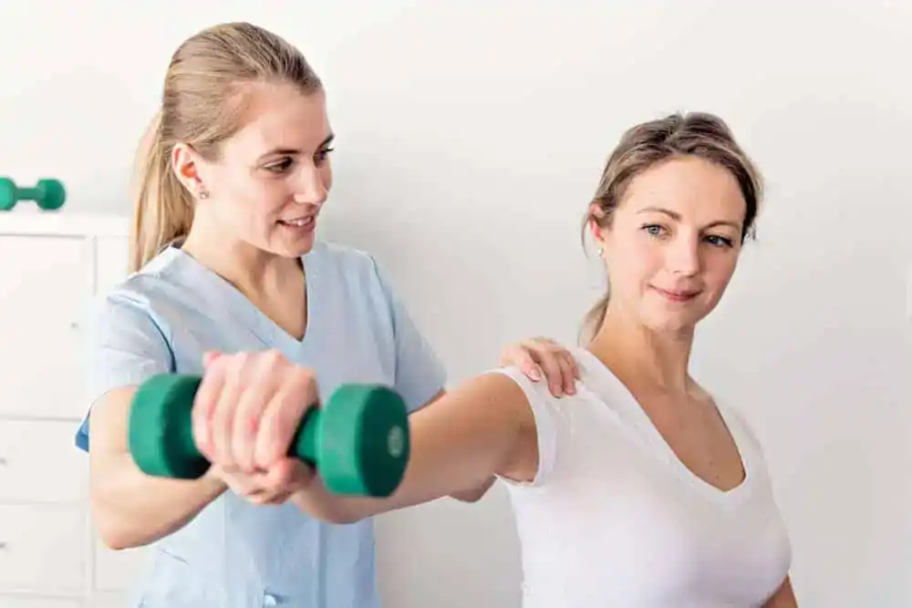 A physiotherapy specialist in NYC providing professional care for a patient with neck pain, using manual therapy and guided exercises for targeted relief and improved mobility.